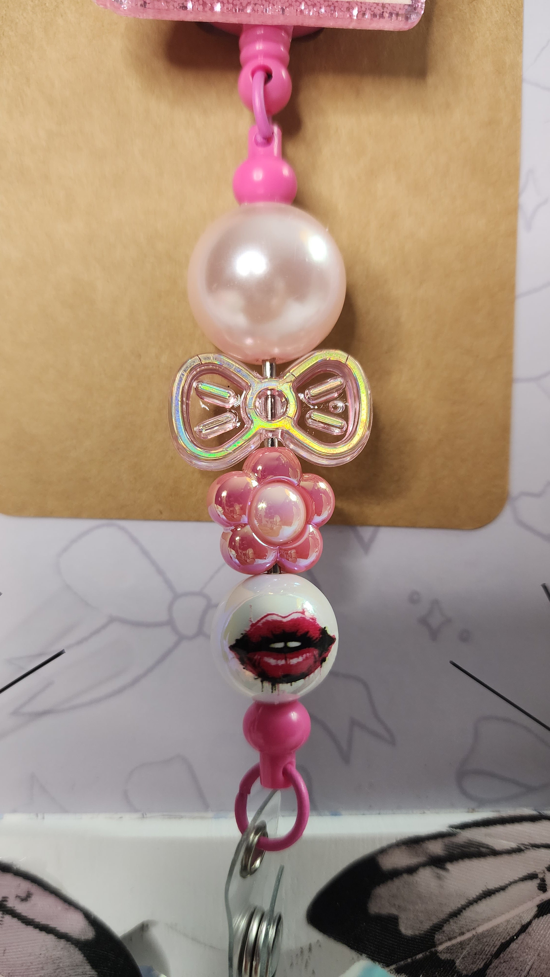 BICHOTA SEASON Badge Reel