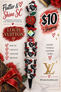 Red apple beaded pen with LV-style heart charms, black and red details; display box, ribbon and background graphics not included