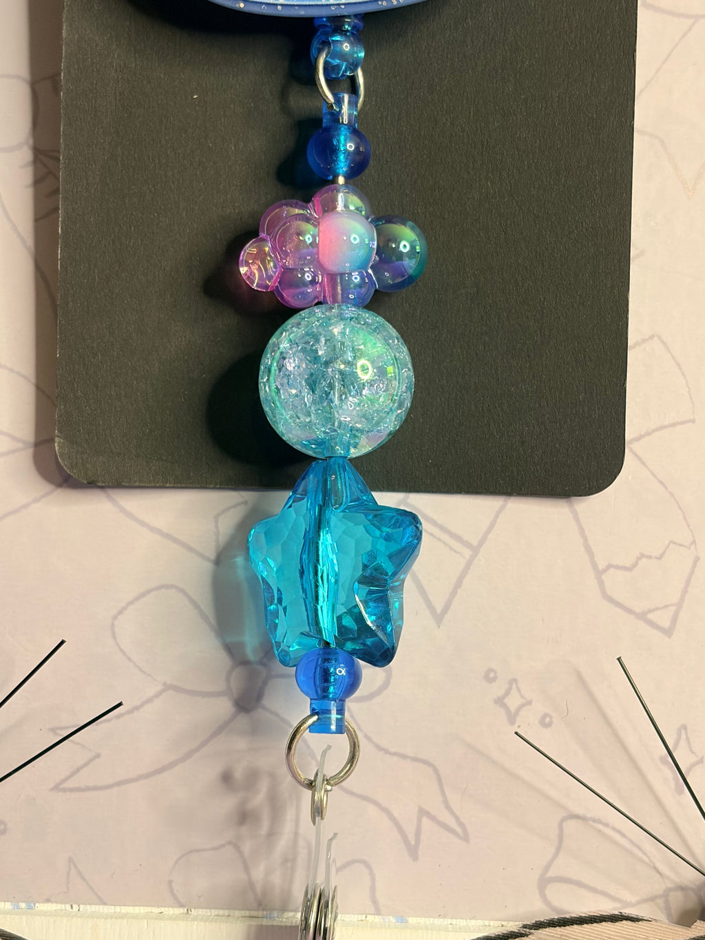 Winter Kawaii Dumpling Badge Reel with Blue Beaded Star Charm