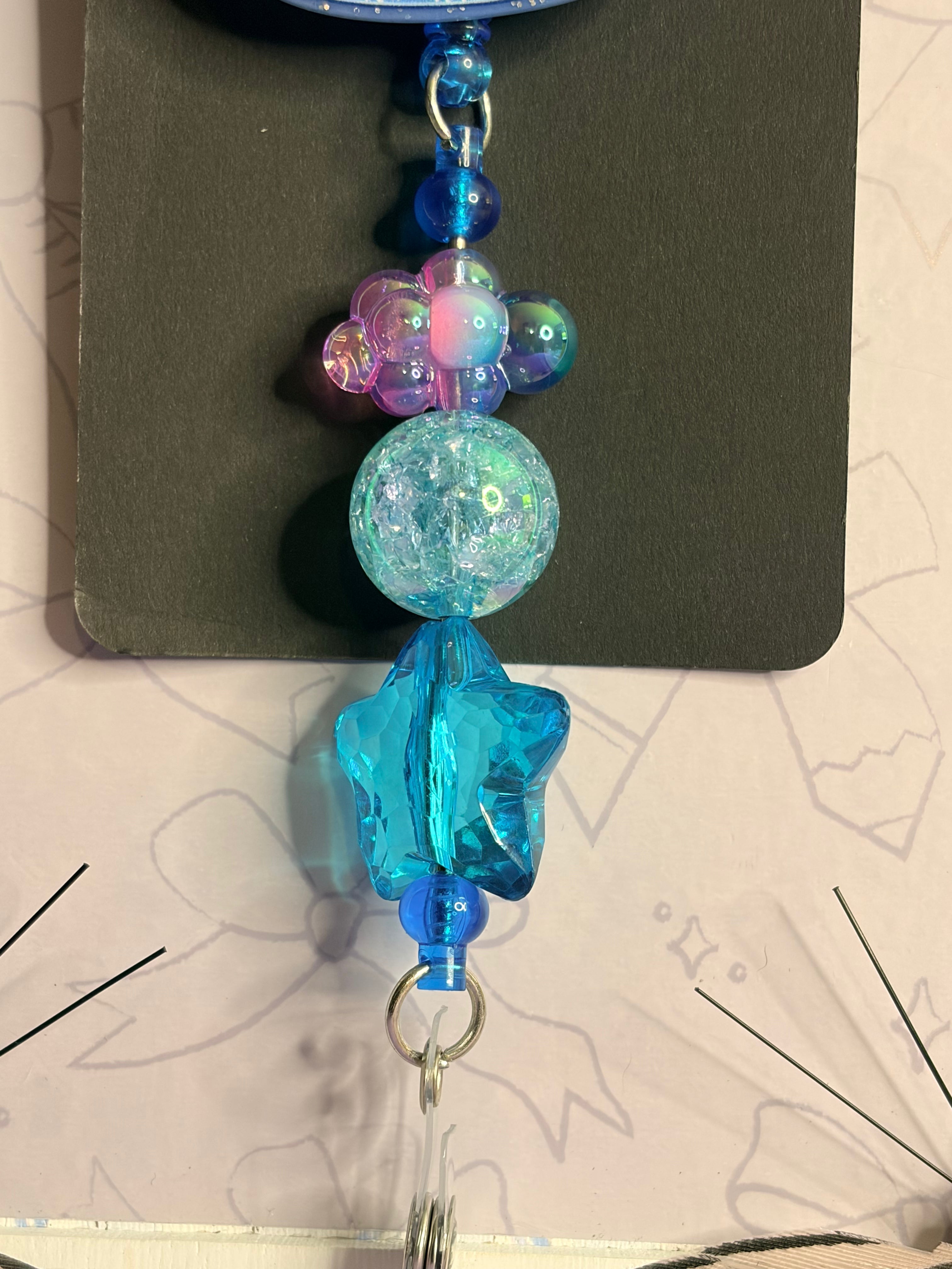 Winter Kawaii Dumpling Badge Reel with Blue Beaded Star Charm
