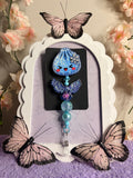 Winter Kawaii Dumpling Badge Reel with Iridescent Angel Wings & Teal Beaded Charm