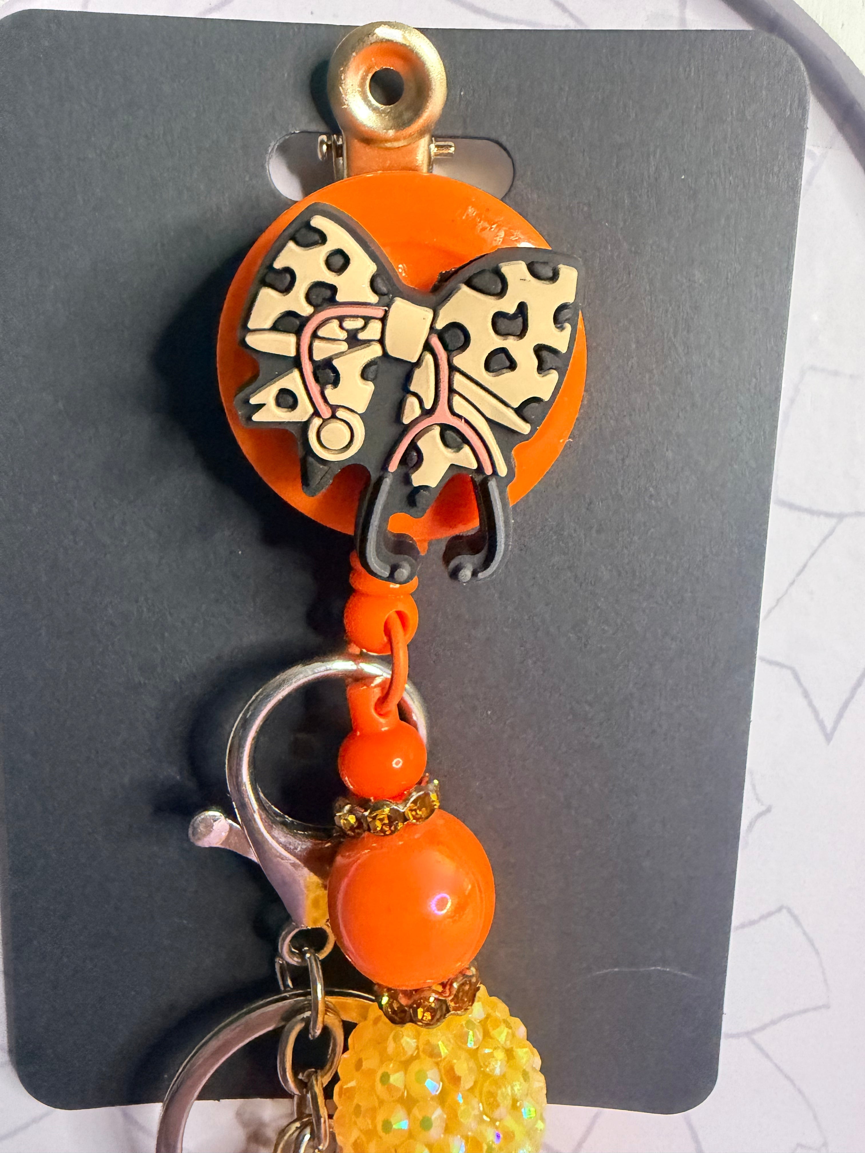 Orange Leopard Bow Badge Reel with Beaded Crown Keychain Charm Combo