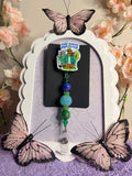 Bad Bunny Debí Tirar Más Fotos Badge Reel with Green & Blue Beaded Charm