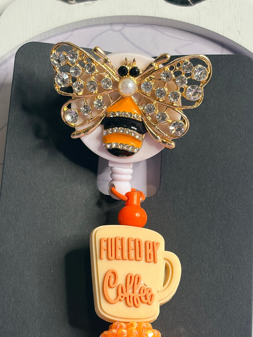 Fueled by Coffee Rhinestone Bumblebee Badge Reel with Orange Beaded Charm