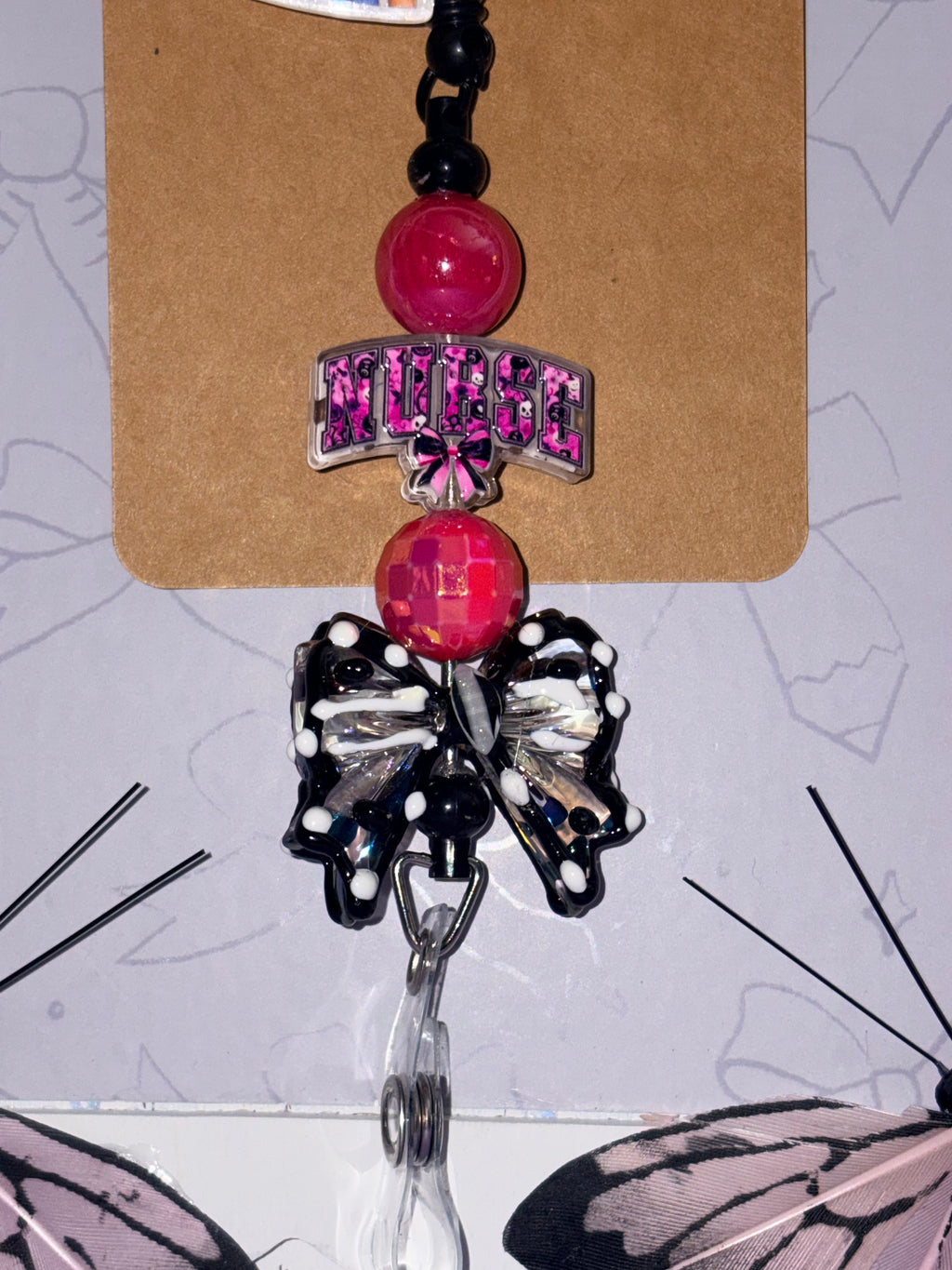In Da Clerb We All Stressed RN Nurse Black Bow Beaded Badge Reel – Handmade