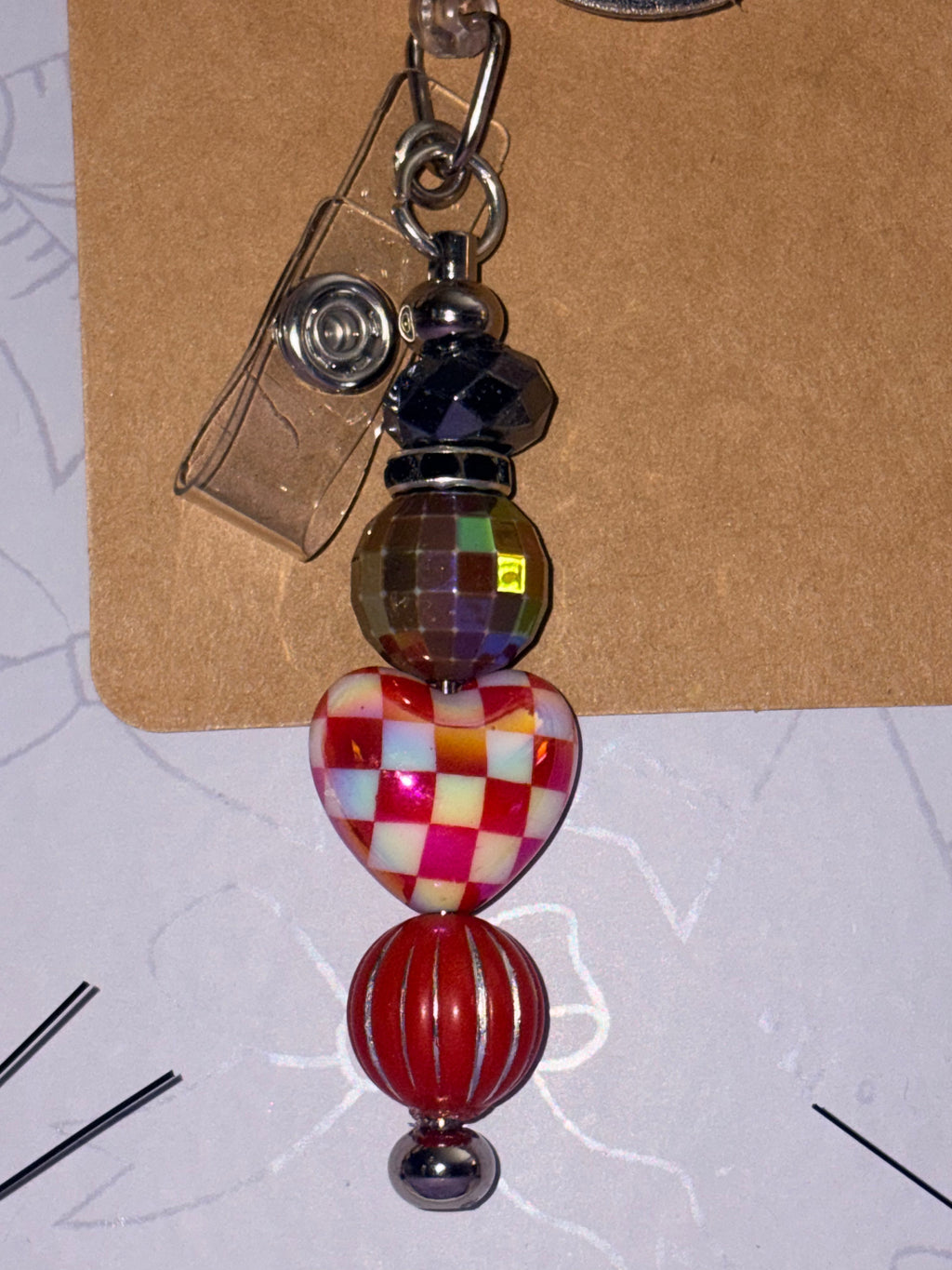 Tengo Chisme Holographic Speech Bubble Checkered Heart Beaded Badge Reel – Handmade