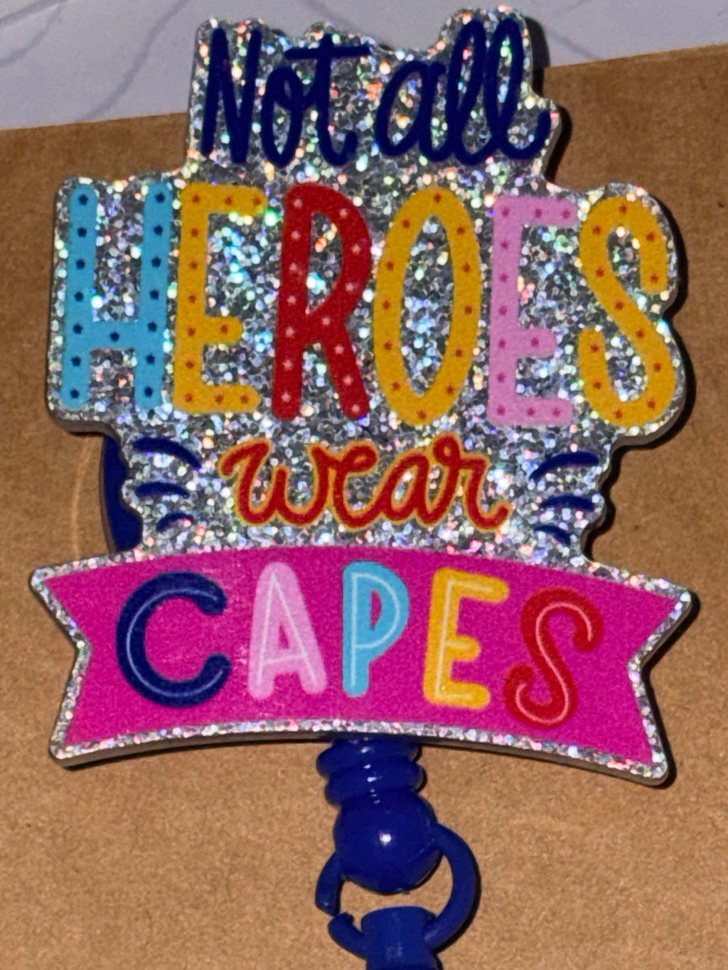 Not All Heroes Wear Capes Silver Holographic Glitter Butterfly Beaded Badge Reel – Handmade