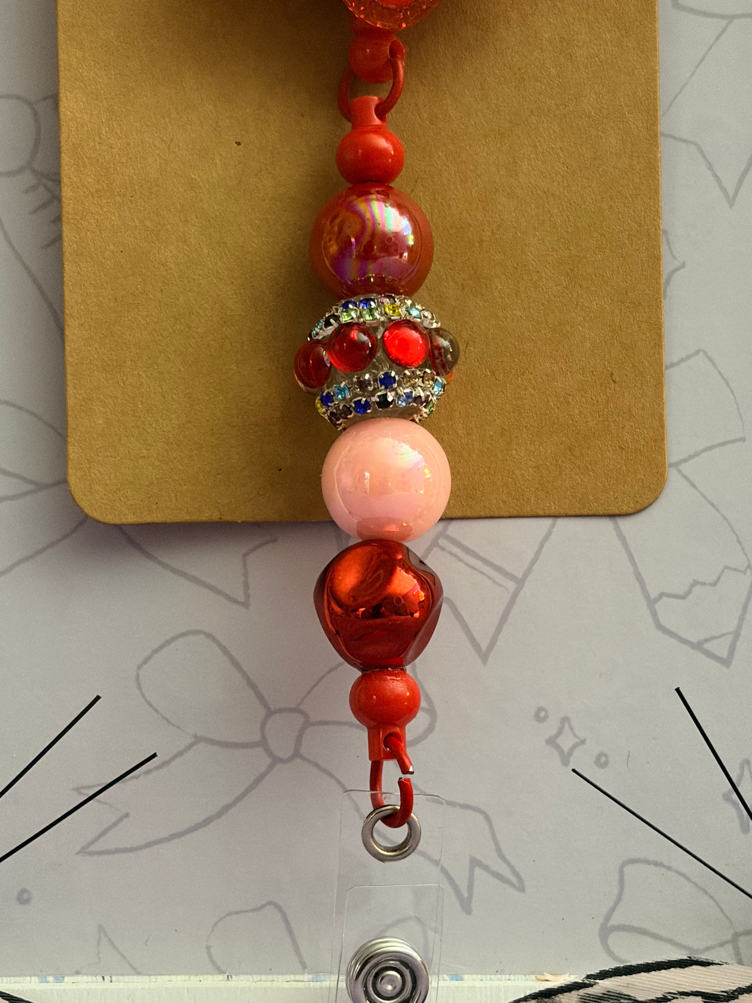 Strawberry Kewpie Baby Beaded Badge Reel