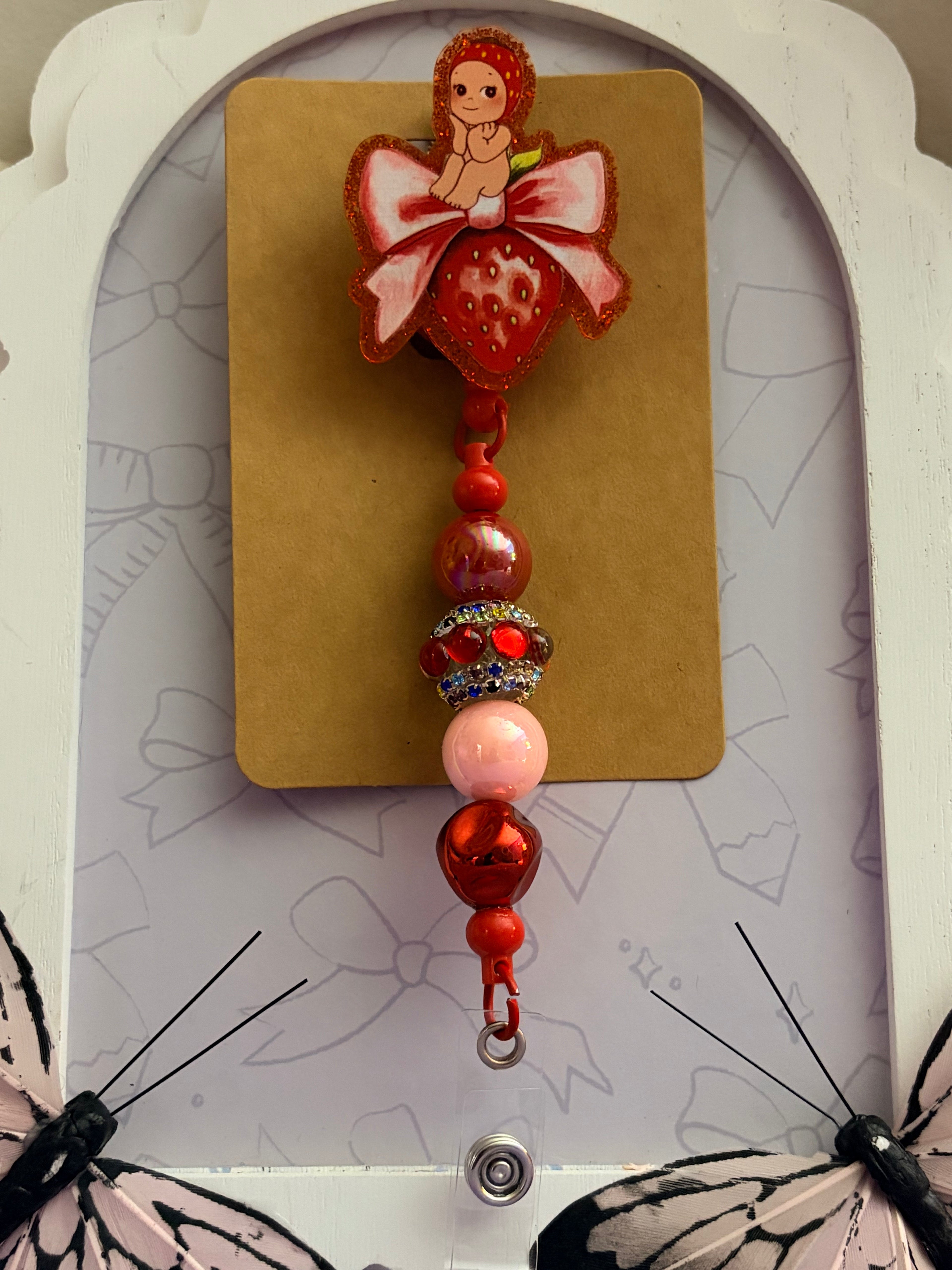 Strawberry Kewpie Baby Beaded Badge Reel