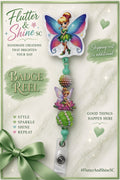 Tinker Bell themed badge reel with multicolor wing topper, fairy on pink flower accent, multicolor textured bead, green bead with sparkling spiral details, and clear snap strap.