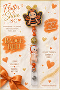 Sonny Angel–inspired badge reel with an orange-and-black butterfly topper, gold glitter edging, orange beads, dangling character charm, and clear badge strap.