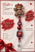 Dr Pepper–inspired badge reel with a brown teddy bear topper, red polka-dot bow, red beads, round logo bead, soda-can-shaped accent, and clear snap badge strap.