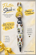 Sanji Themed beaded pen with blonde character in black, translucent yellow bead, black-and-gray swirled bead, white One Piece character-decorated barrel, and dark pointed tip.